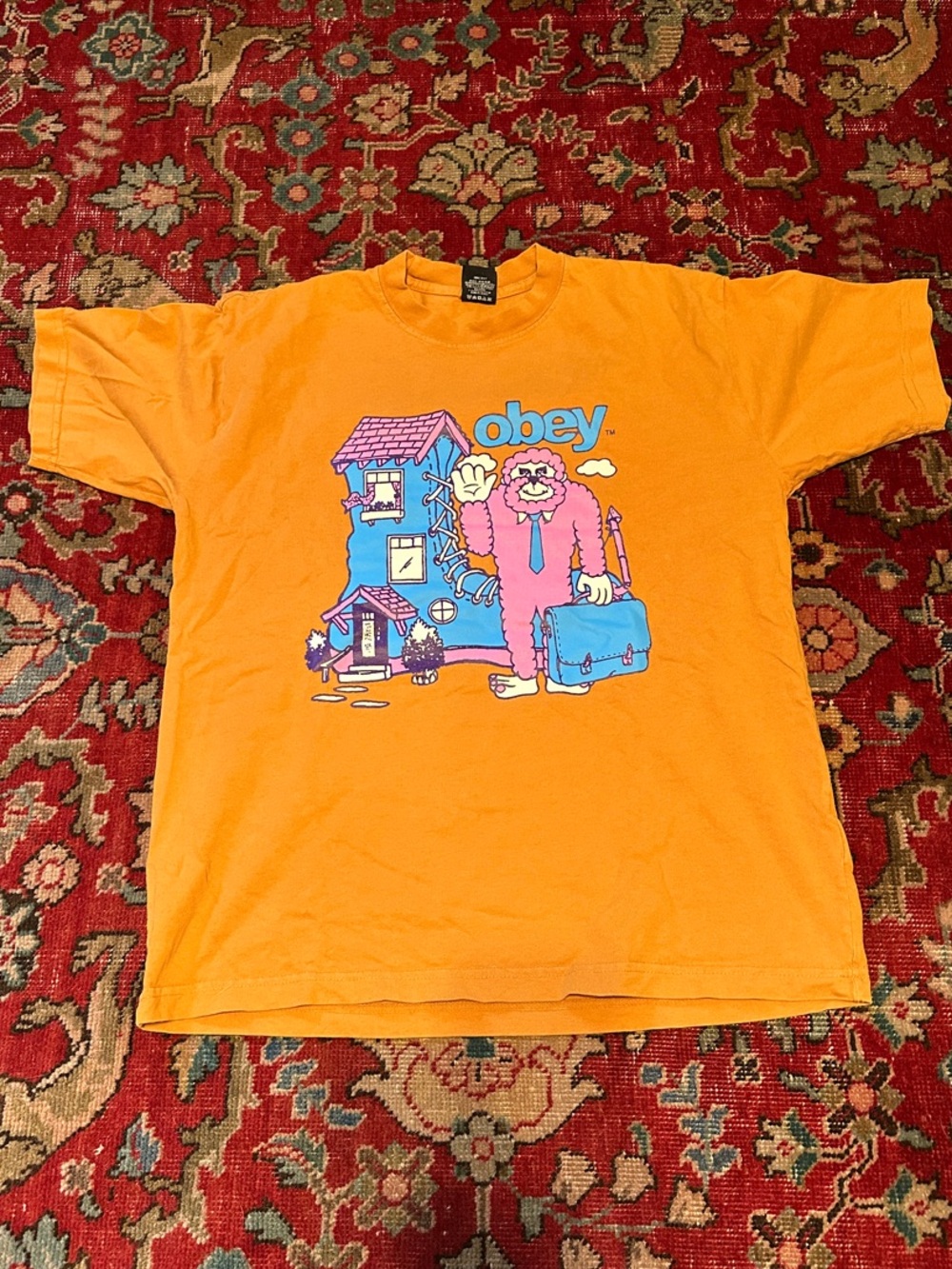 Obey Mustard Yellow Graphic Tee with Pink and Blue Print